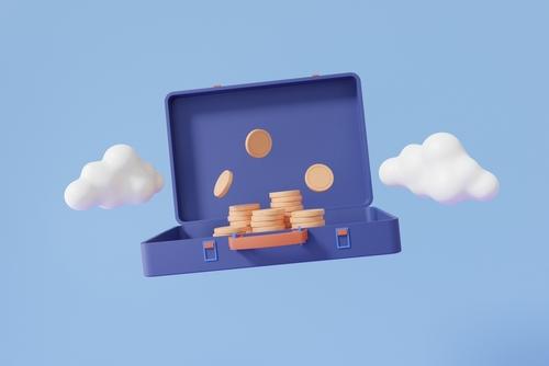 Open blue suitcase with coins floating and stacked inside, surrounded by fluffy clouds against a light blue background.